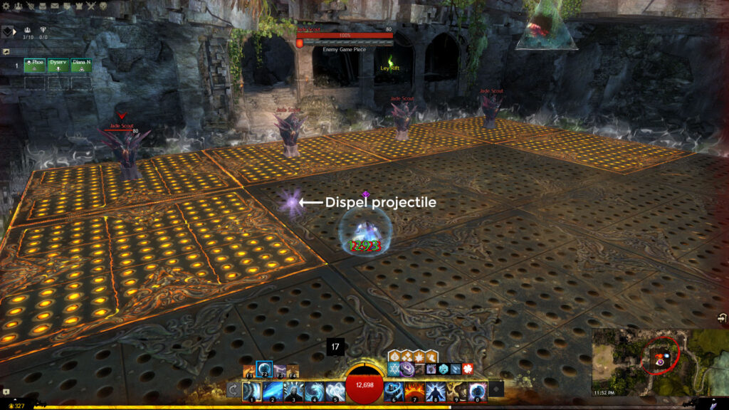A player using Dispel with the light purple projectile labeled